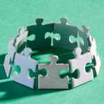 Ring of puzzle pieces