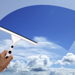 Cleaning window with a squeegee