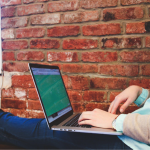 woman taking fundraising quiz on laptop